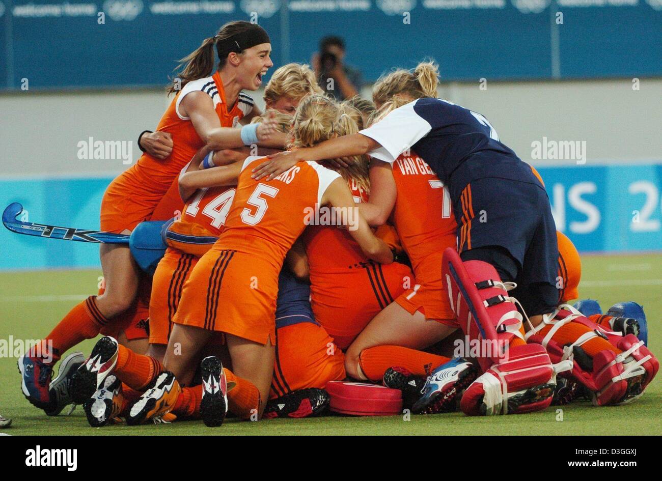 (dpa) - The women's field hockey team from the Netherlands form a pile of celebration after defeating Argentina in the Women's Olympic Field Hockey Tournament's semifinal match in Athens, Greece, 24 August 2004. Stock Photo