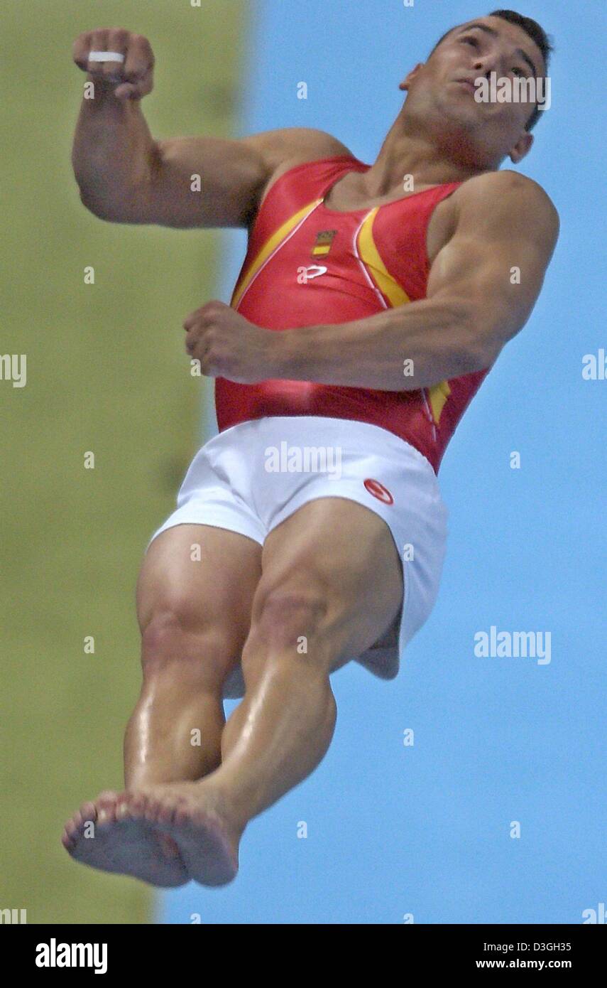 (dpa) - Spanish gymnast Gervasio Deferr is airborne during the Men's Olympic Vault final in Athens, Greece, 23 August 2004. Deferr won the gold medal with Evgeni Sapronenko of Latvia getting silver and Romanian Marian Dragulescu winning the bronze medal. Stock Photo