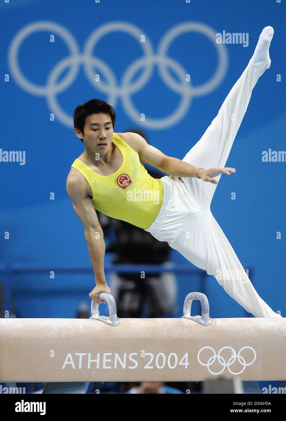 (dpa) Gold medal winner Haibin Teng of China performs during the men