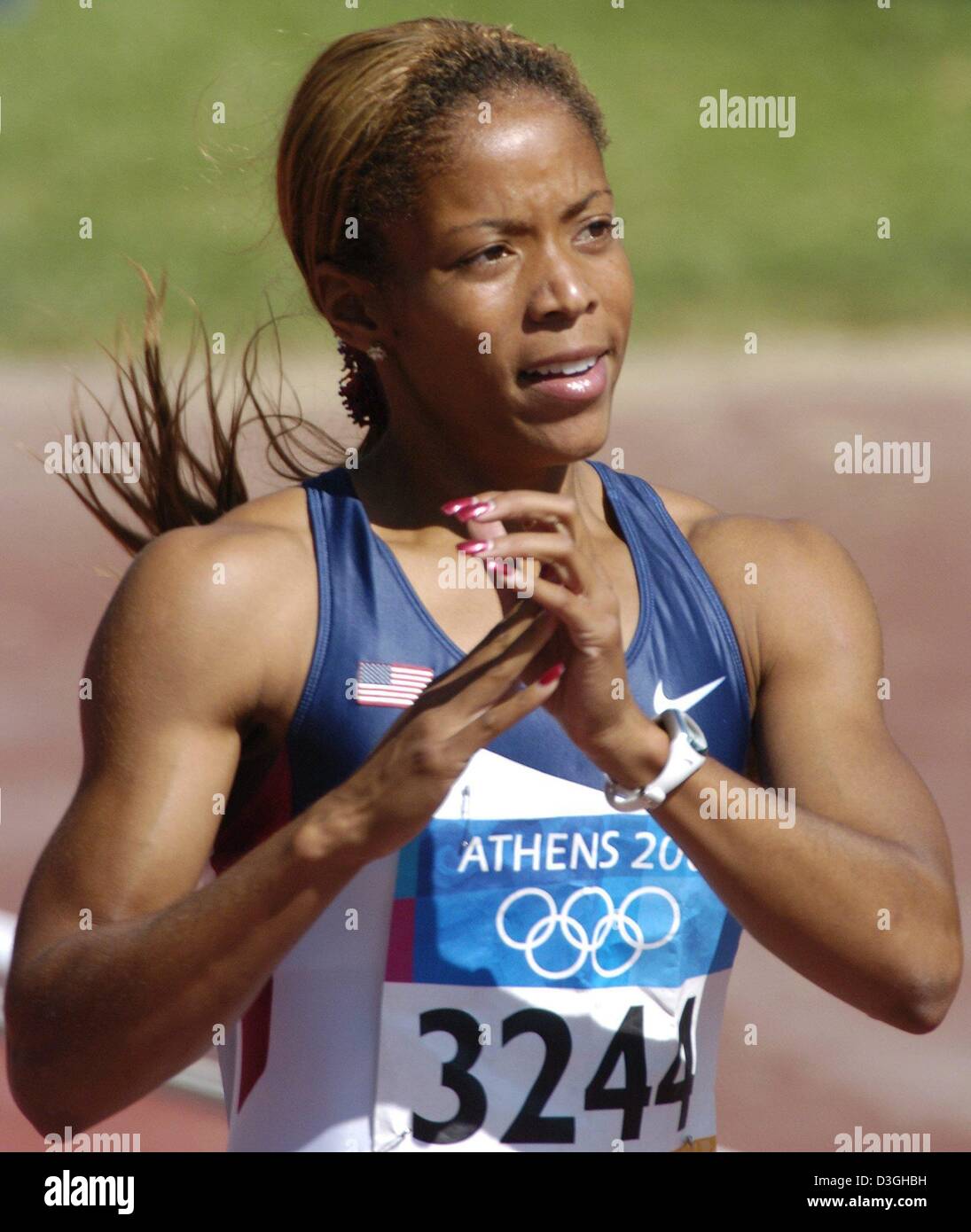 (dpa) US runner LaTasha Colander pictured after finishing her heat in