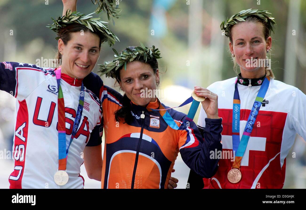 dpa) - Dutch cyclist Leontien Zijlaard van Moorsel (C), US rider Deirdre  Demet-Barry (L) and Swiss rider Karin Thuerig cheer on the podium after the  women's Cycling Time Trial event of the