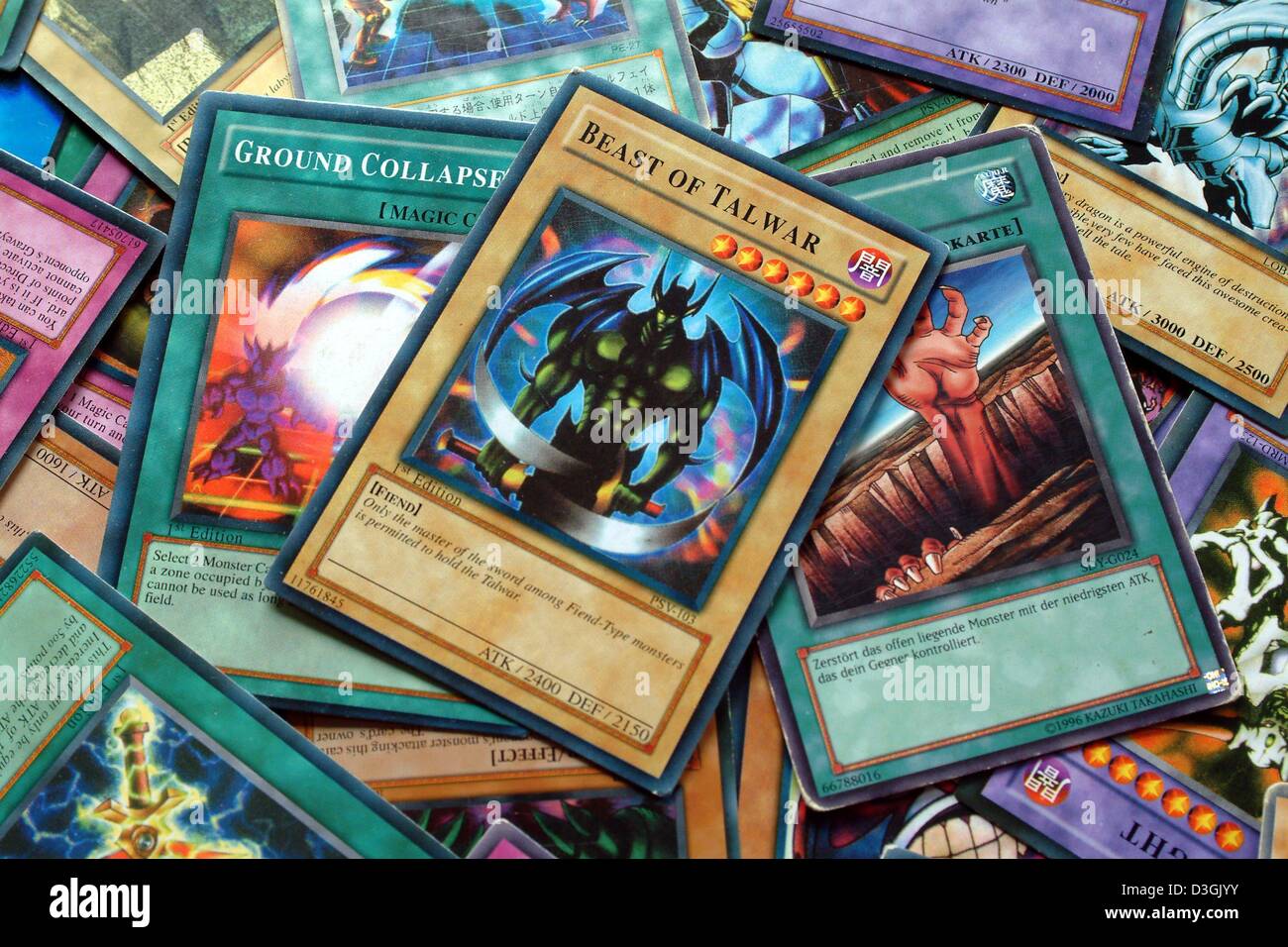 (dpa) - A pile of YuGiOh cards pictured in Frankfurt, Germany, 15 July 2004. YuGiOh comes from Japan and debuted in 1996 as a comic book series about a game player with mystical powers. The cards became a hit with children, who collect, swap and play with the cards. Stock Photo