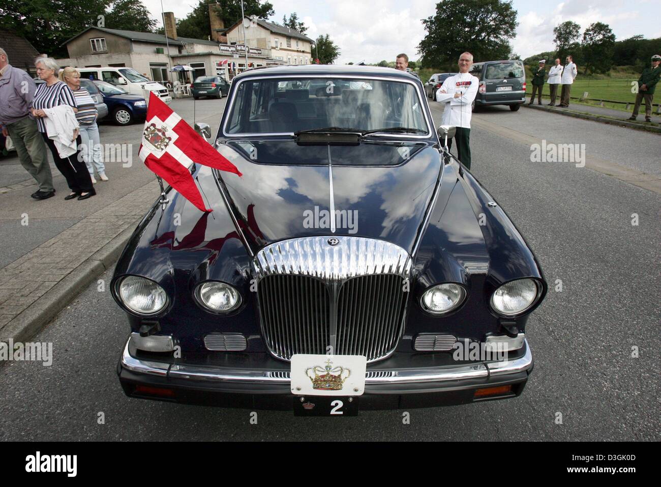 (dpa) - The official car of Queen Margrethe II of Denmark, an about 40 year old Daimler, pictured in Schleswig, northern Germany, 27 July 2004. The Danish royal couple are in Germany for the 1,200th anniversary of the town of Schleswig. Their trip will also take them to the historic sites of the former dukedom which was under rule of the Danish crown until 1864. Stock Photo