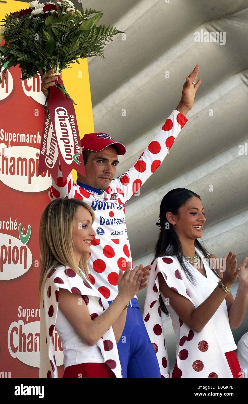 (dpa) - French cyclist Richard Virenque of team Quick Step-Davitamon wears the best climber's white and red polka-dotted jersey after the tenth stage of the Tour de France cycling race in Saint-Flour, France, 14 July 2004. The 237km long first mountain stage took the cyclists from Limoges through the Massif Central to Saint-Flour. Virenque also won the stage. Stock Photo