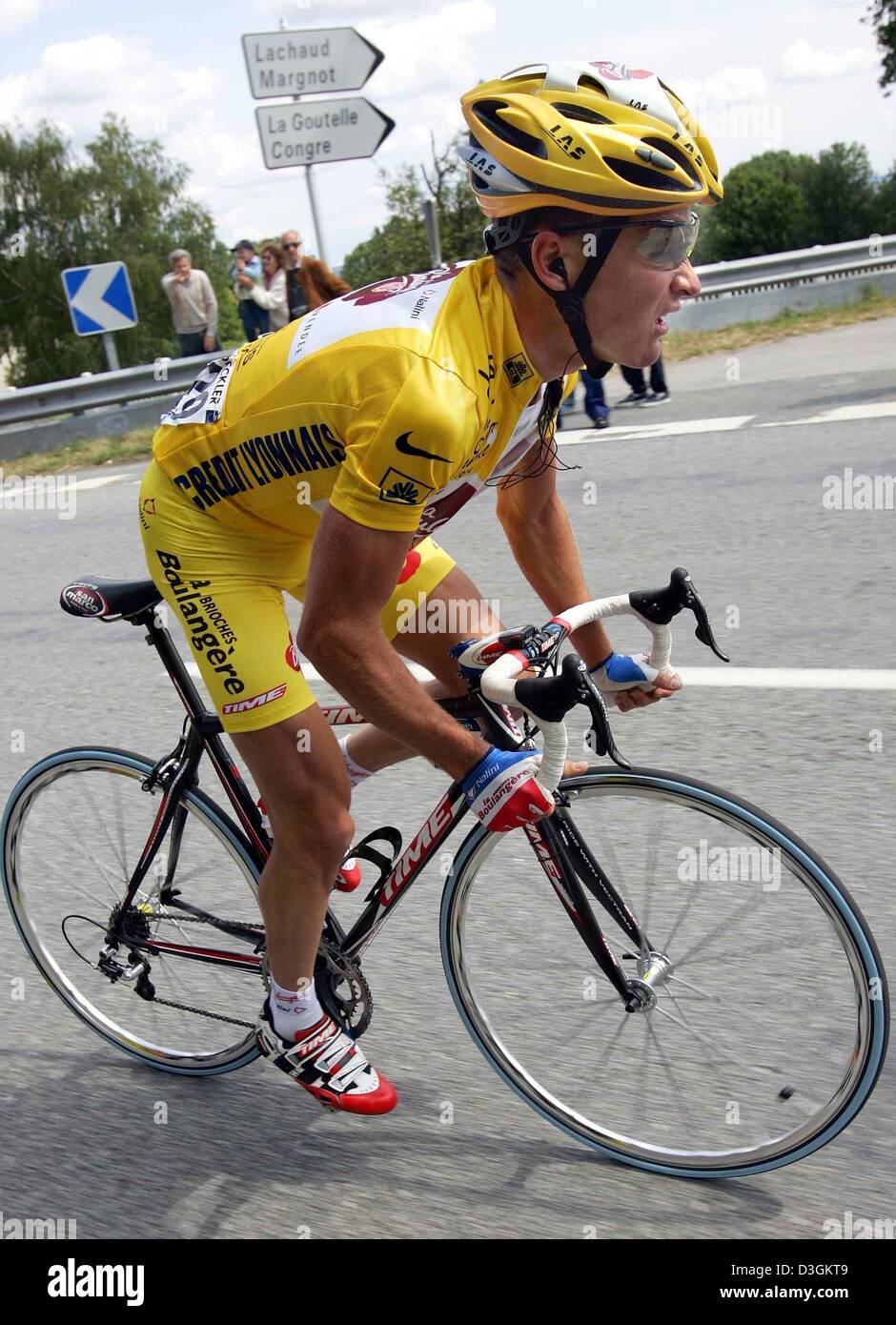(dpa) - 25-year-old French cyclist Thomas Voeckler of team Brioches La Boulangere wears the race leader's yellow jersey during the ninth stage of the Tour de France cycling race in France, 13 July 2004. The 160.5km long stage took the cyclists from Saint-Leonard-de-Noblat to Gueret. During the 10th stage Voeckler wears the yellow jersey for the fifth consecutive day. Stock Photo