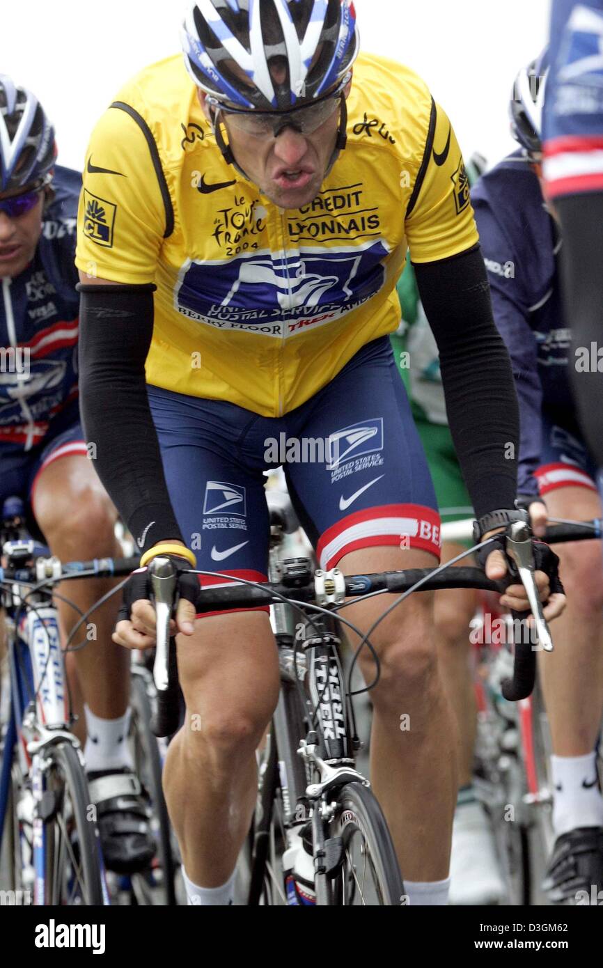 (dpa) - US Postal team rider and five-time Tour de France winner Lance Armstrong from the US wears the yellow jersey of the front runner as he leads the field of cyclists during the Tour de France cycling race in Amiens, France, 8 July 2004. The 200.5km long fifth stage of the Tour de France led the cyclists from Amiens to Chartres. Stock Photo
