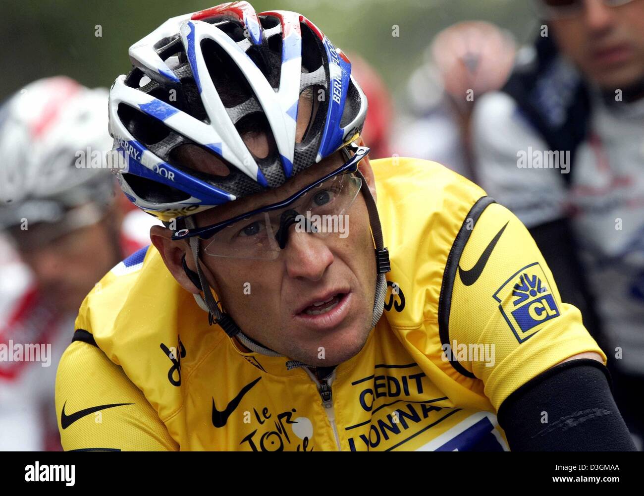(dpa) - US cyclist Lance Armstrong of team US Postal wearing the yellow jersey of the overall leader races during the 200.5 km long 5th stage of the Tour de France cycling race from Amiens to Chartres, France, 8 July 2004. Stock Photo