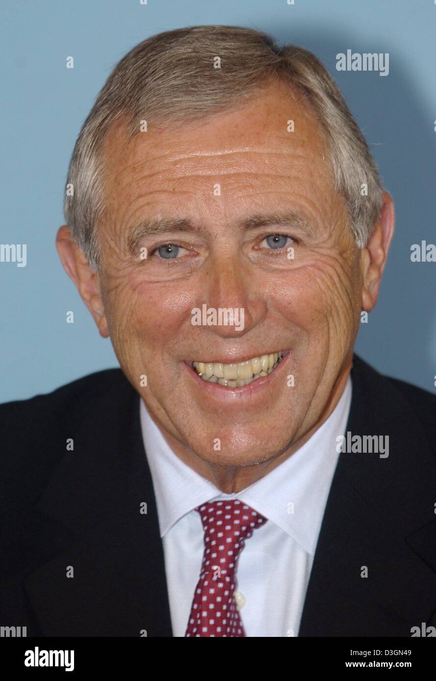 (dpa) - Danish transport minister Flemming Hansen smiles during a meeting in Berlin, Germany, 23 June 2004. Hansen and his German counterpart Manfred Stolpe discussed plans to build a bridge, tunnel or both, to form a fixed road and rail link spanning the 19-kilometre-wide Fehmarn strait between Germany and Denmark. Stock Photo