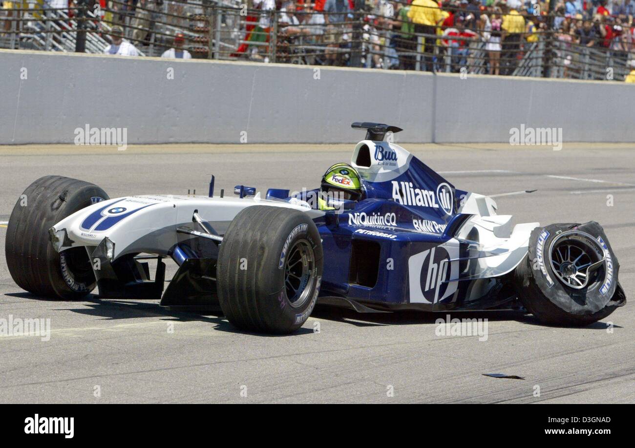 (dpa) - German formula one pilot Ralf Schumacher of BMW-Williams sits motionless in his racing car waiting for the arrival of the paramedics after his accident during the US Grand Prix on the racetrack in Indianapolis, USA, 20 June 2004. Ralf Schumach ran with a top speed of around 300 kilometres per hour into a barrier along the racetrack in the tenth lap of the race. Stock Photo