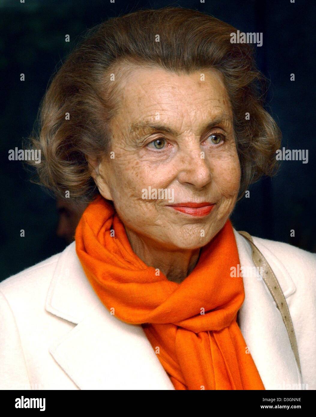 The trial pitting the daughter of France's richest woman, Liliane Bettencourt, against a celebrity photographer who received nearly 1 billion euros (1.23 billion dollars) worth of gifts from her was postponed Thursday (01 July 2010) after several hours of hearings. In this file picture vom 13 June 2004 Liliane Bettencourt  is visiting an exhibition of photographer Banier in Krefeld Stock Photo