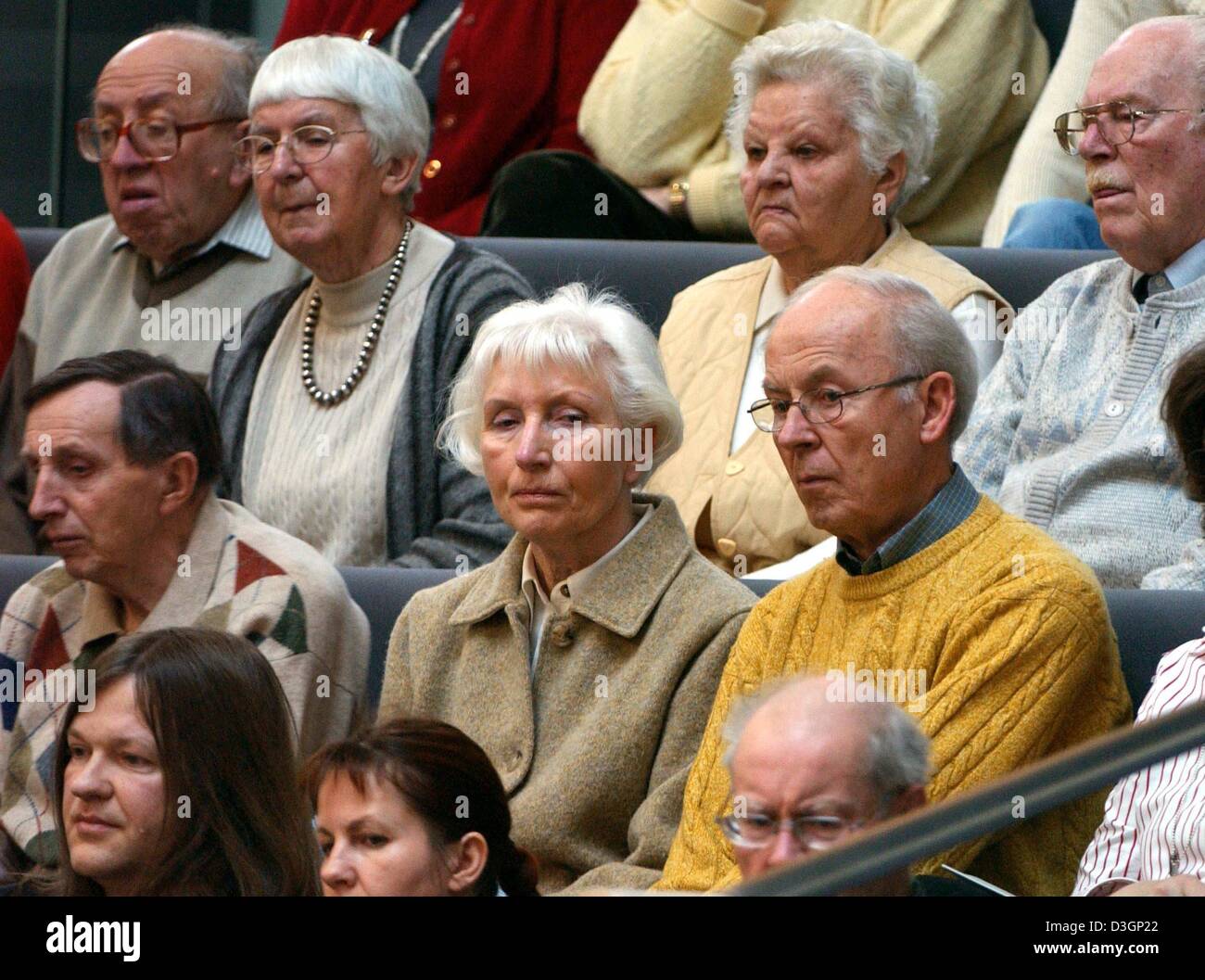 (dpa) - A group of elderly visitors follow the debate on pension cuts in the Bundestag, the lower house of parliament, in Berlin, on Thursday, 11 March 2004. Germany's parliament Thursday approved a pension reform which will cut state pensions in the coming years despite unease among some members of the Social Democratic Party. The reform aims to keep German state pensions from fal Stock Photo