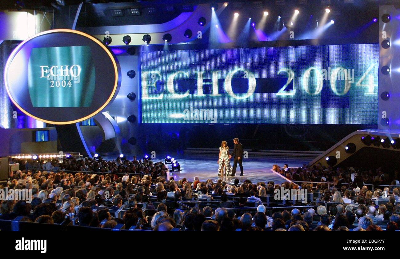 (dpa) - A view into the International Congress Centrum (ICC) during the Echo music awards show in Berlin, 6 March 2004. On stage are host Oliver Geissen and singer Vanessa of the girls band No Angels. The Echo award is the most important prize of the worldwide music industry following the American Grammy award. Stock Photo