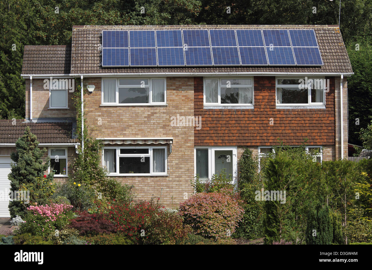Solar photovoltaic panel array on house roof Stock Photo - Alamy