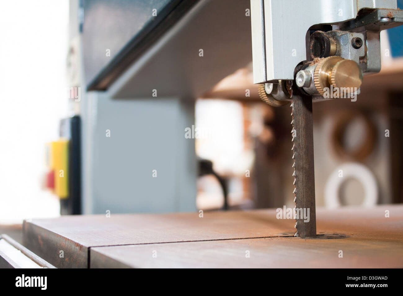 Woodworking machine Band saw machine cutting planks Stock Photo Alamy