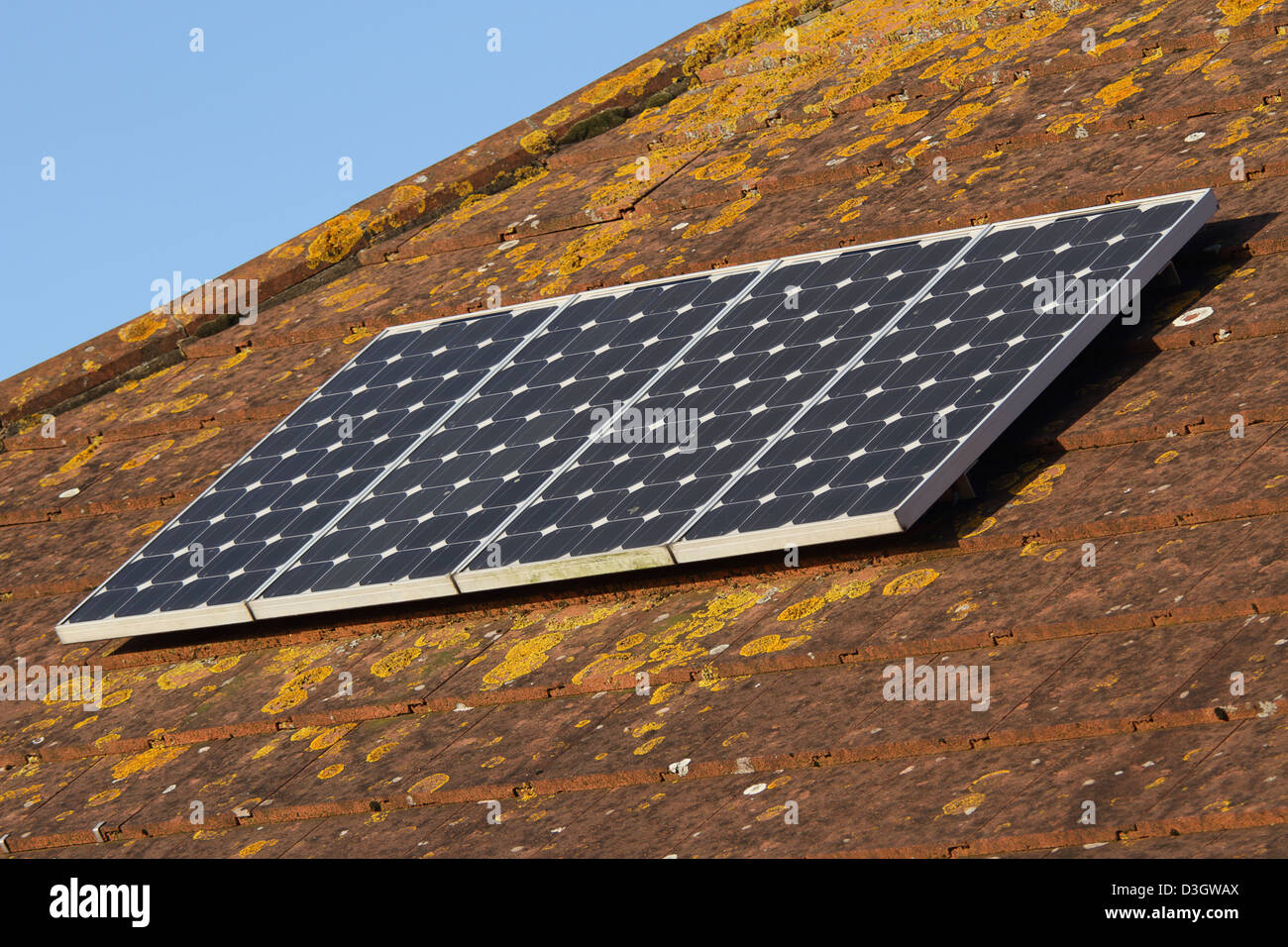 Solar photovoltaic panel roof array Stock Photo - Alamy