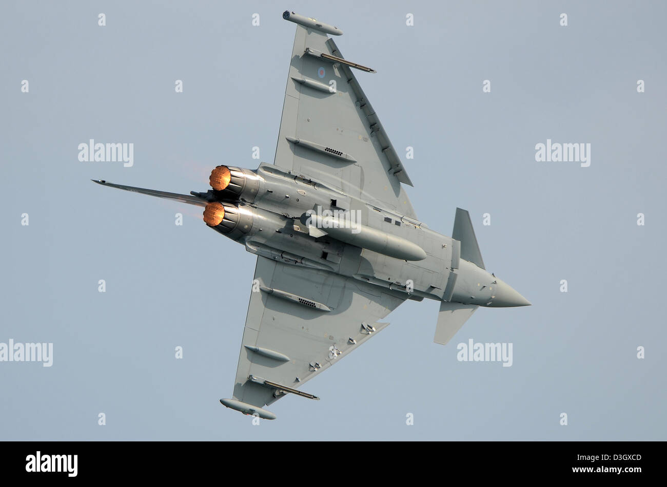 RAF Typhoon FGR4 Eurofighter jet fighter plane from 6 Sqn flying at the airshow at Folkestone, Kent, showing its reheat afterburner. Space for copy Stock Photo