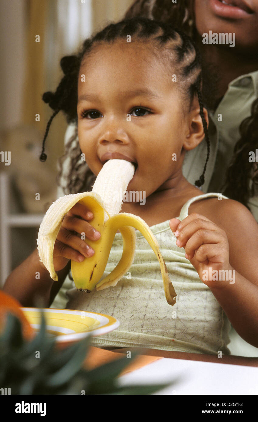 black people eating bananas
