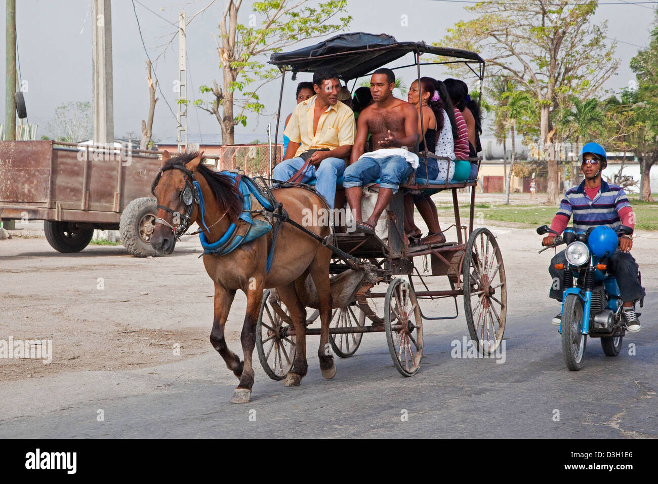 Public transport by horse and carriage in street, Granma, Cuba, Caribbean Stock Photo