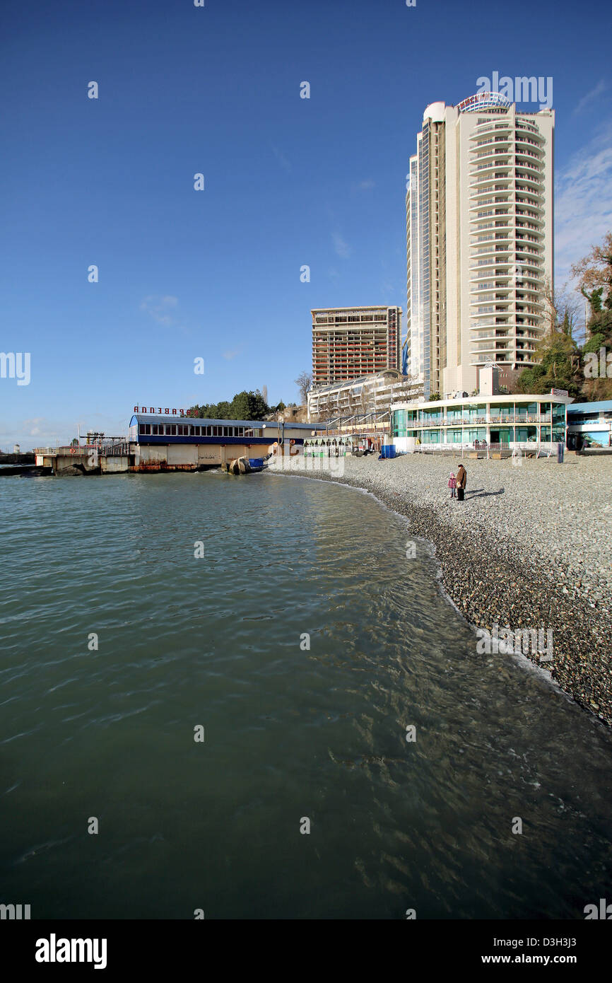 A view of the seafront with close-by residential buildings and hotel ...