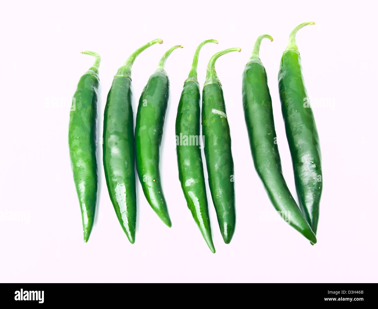 Green peppers isolated on white background Stock Photo - Alamy