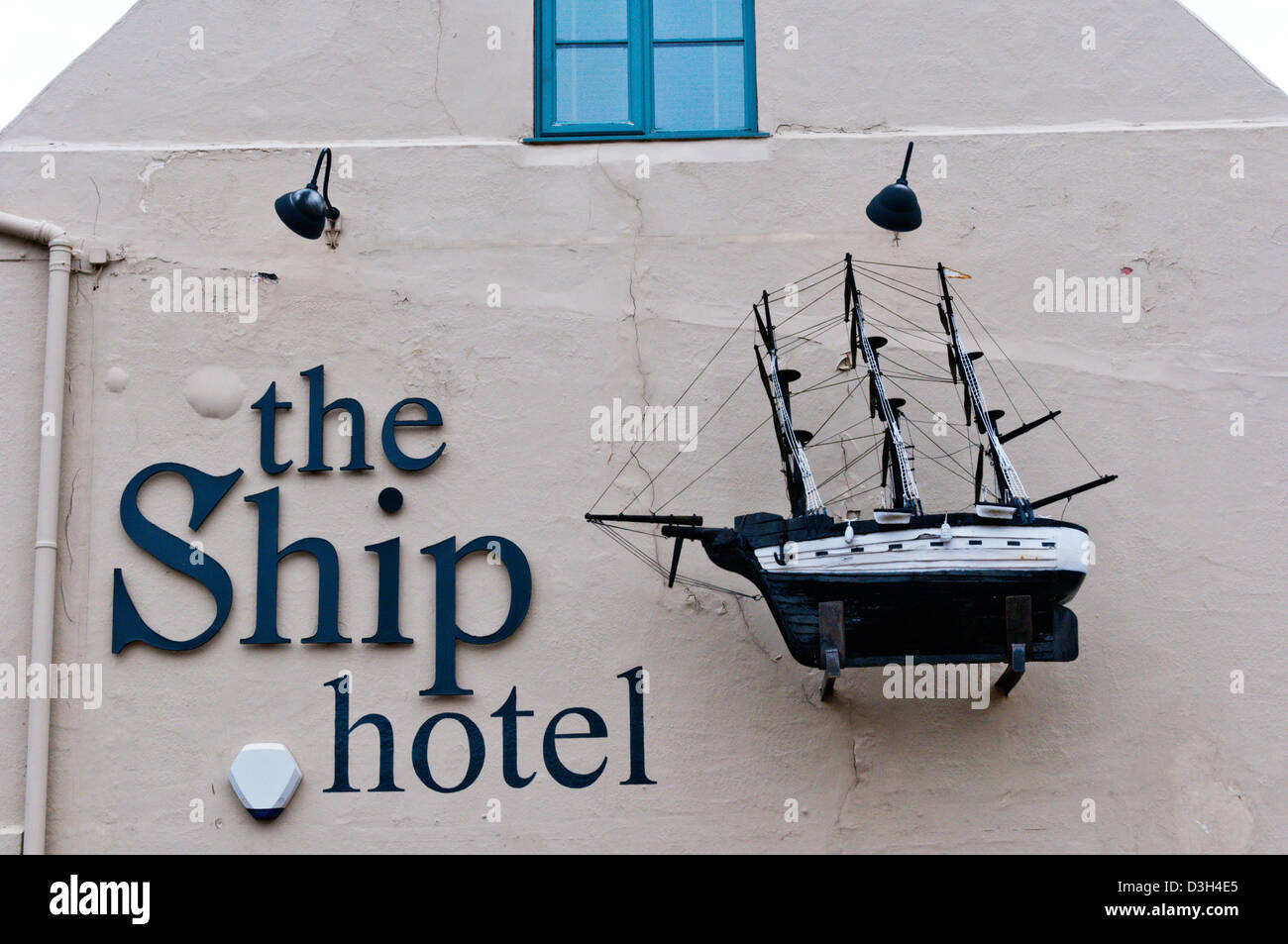 Model ship on end of The Ship Hotel at Brancaster on the North Norfolk coast, England Stock Photo