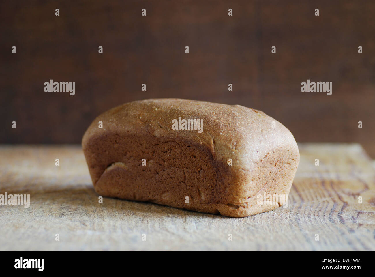 Artisan Bread Whole Wheat Bread Loaf on wood cutting board Stock Photo ...