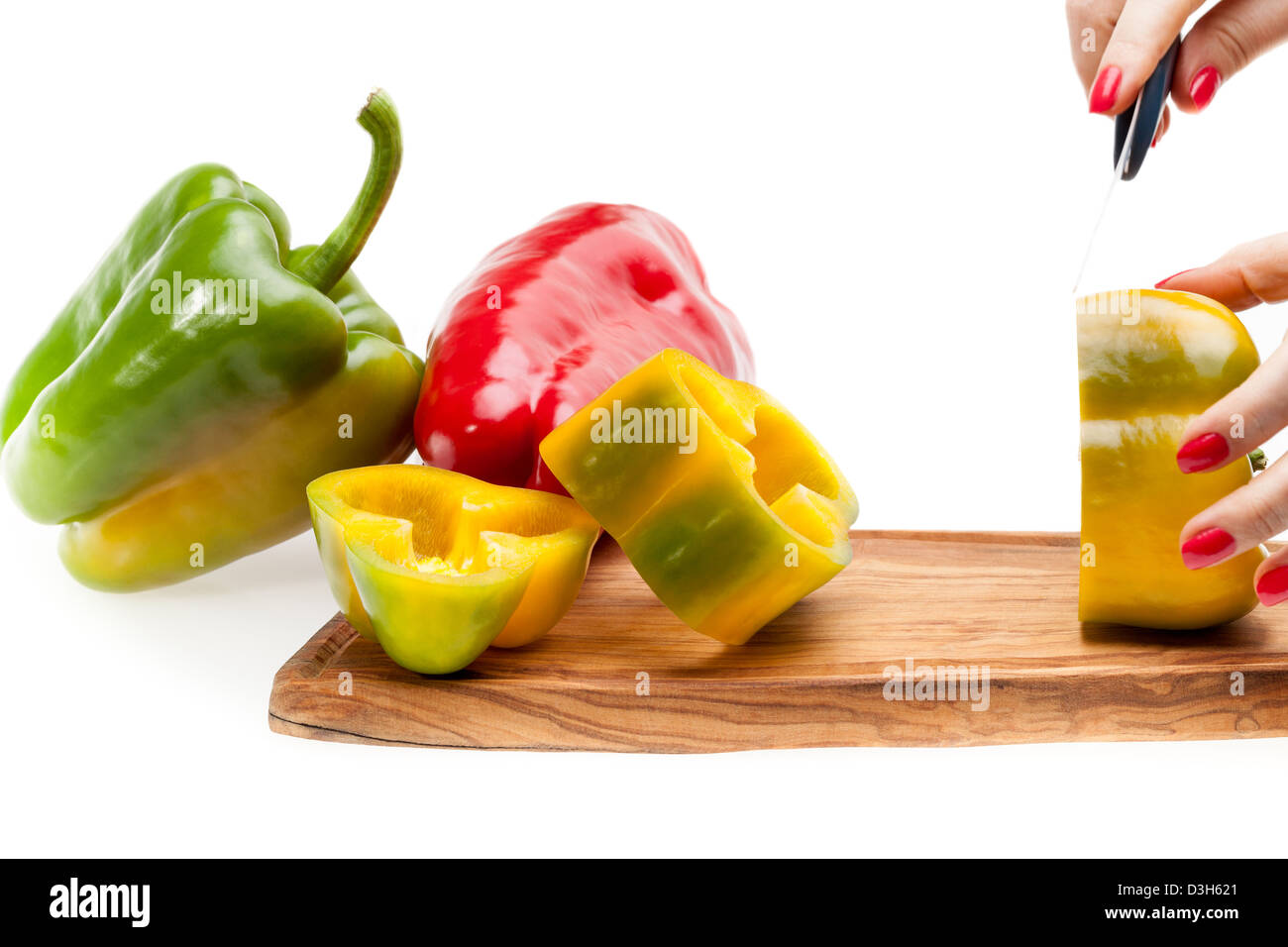 Chopping Peppers On Board Stock Photo - Alamy