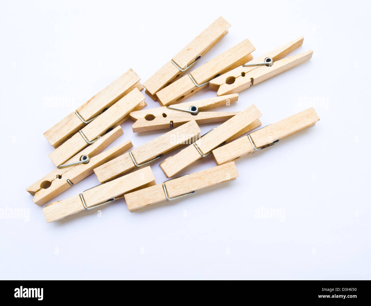 Wooden clothes clips isolated on white background Stock Photo Alamy