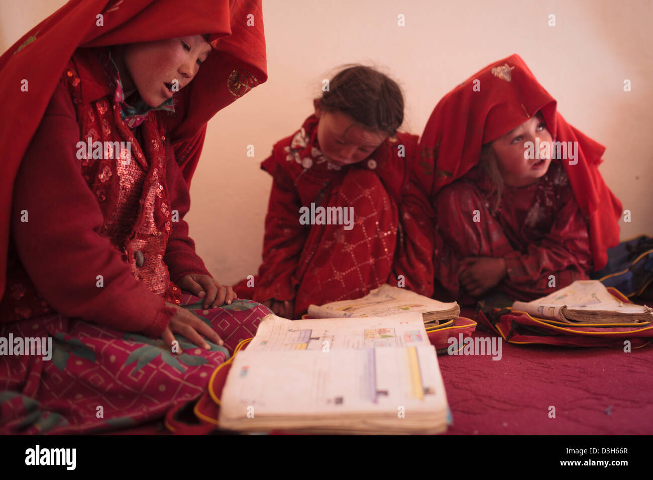 Kyrgyz students  studying at a Central Asia Inst funded school in Bozai Gumbaz, in the Wakhan, Afghanistan. Stock Photo