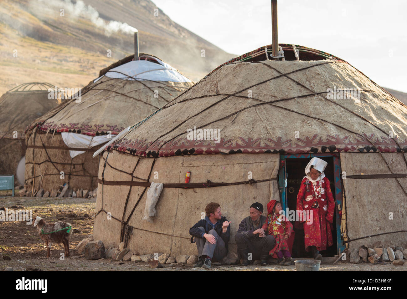 Tourist talking to Kyrgyz in the Wakhan Corridor, Badakhshan, Afghanistan Stock Photo
