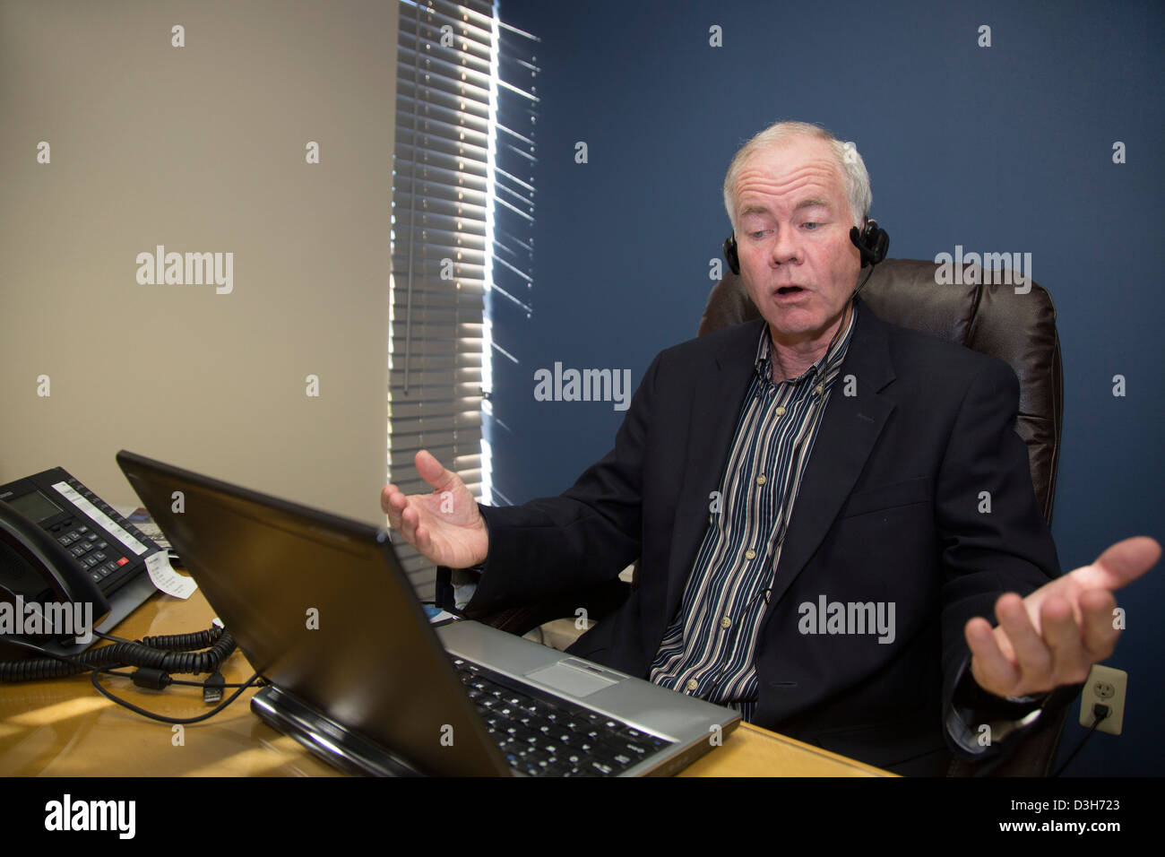 Auto industry analyst John McElroy records a radio broadcast Stock