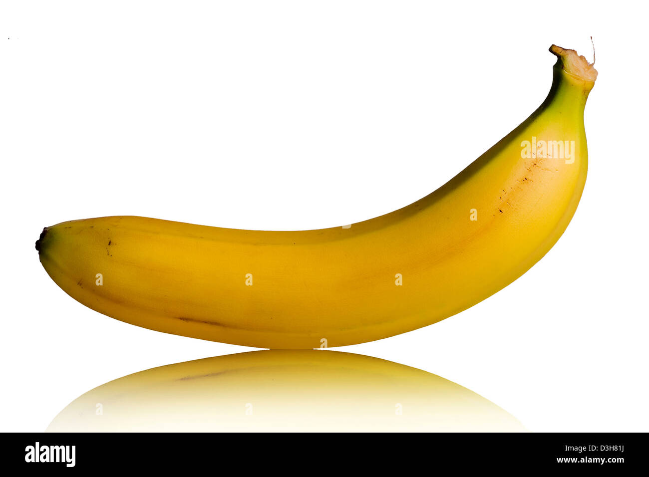 Yellow banana with reflex in the floor on white background Stock Photo