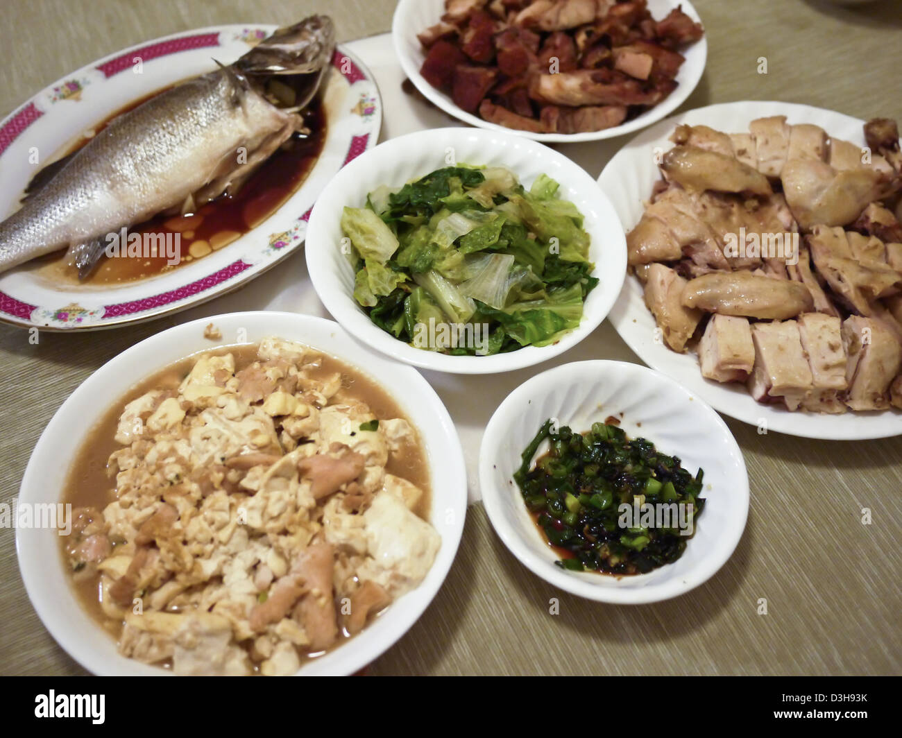 Chinese new year dinner dishes home celebration Stock Photo