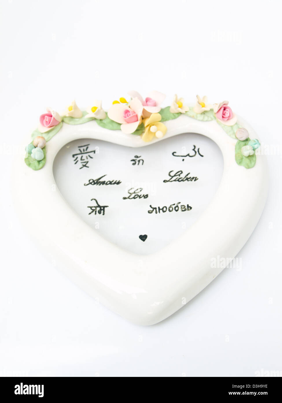 A white ceramic hearth with various language meaning of love Stock