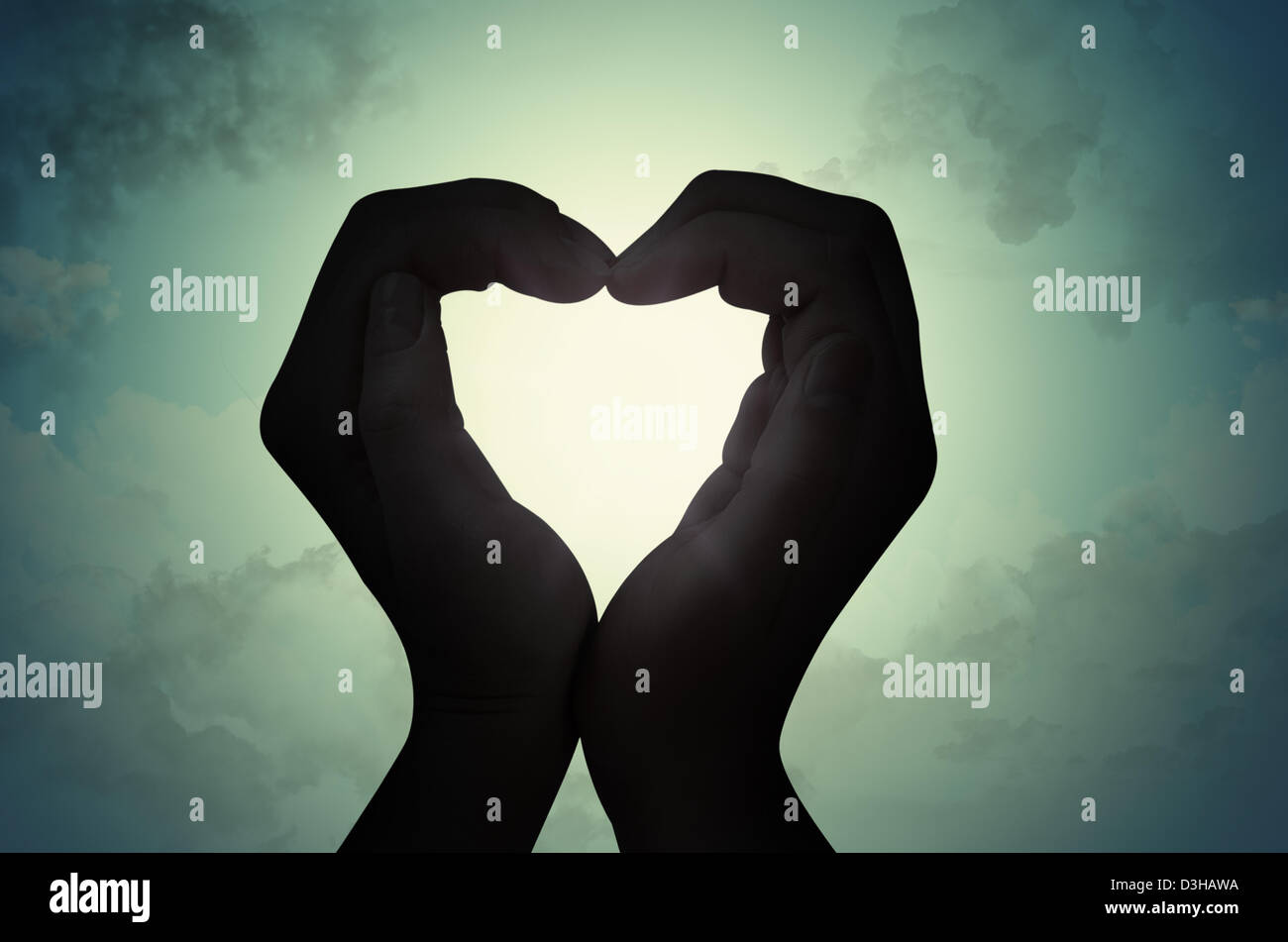 love shape hand silhouette in sky Stock Photo - Alamy