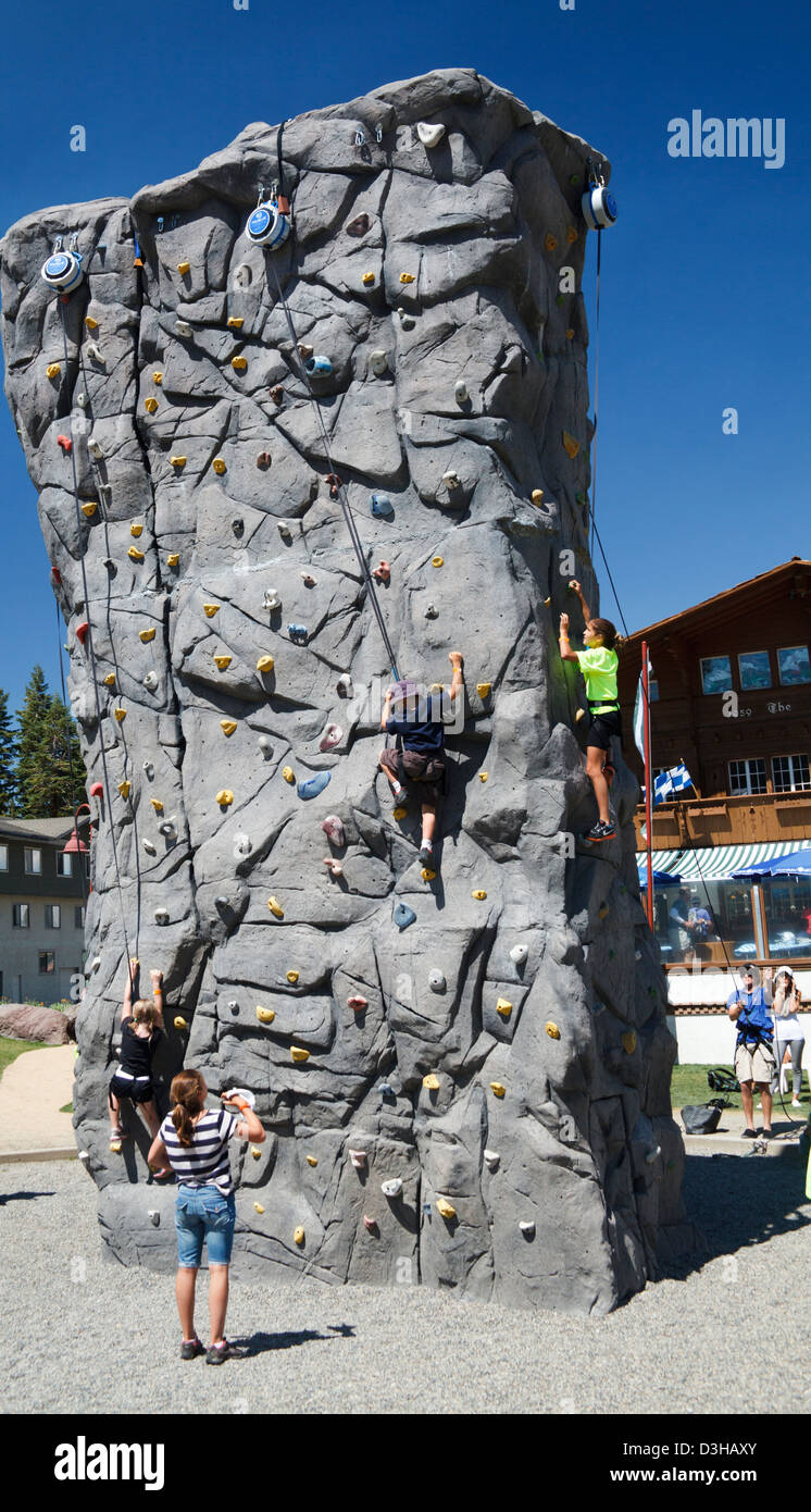 Children climb at the Adventure Center at Mammoth Mountain in Mammoth Lakes, California Stock Photo