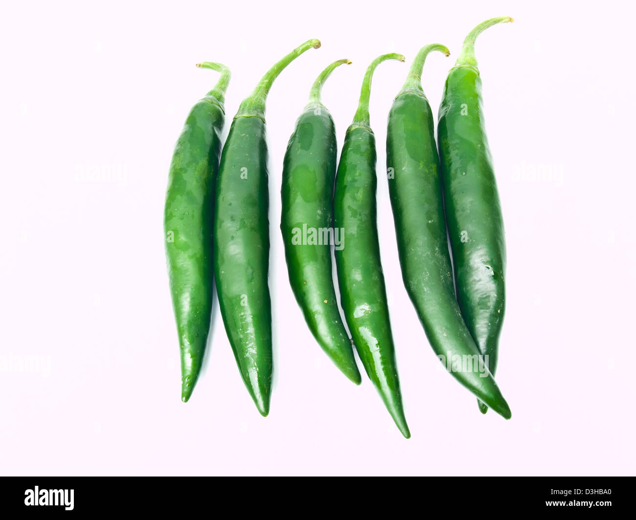 Green peppers isolated on white background Stock Photo - Alamy