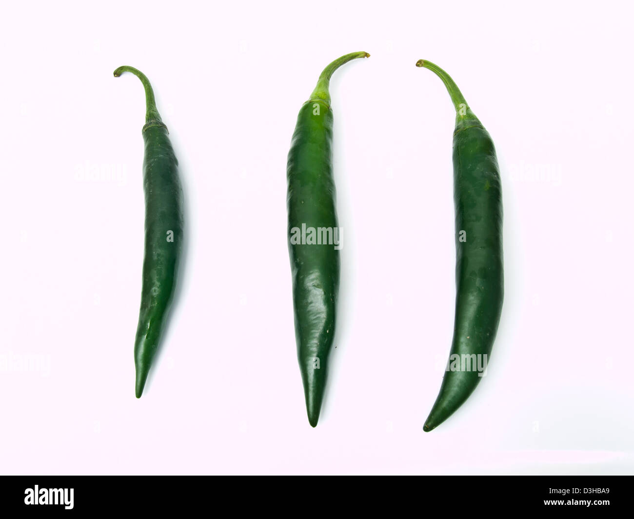 Green peppers isolated on white background Stock Photo - Alamy