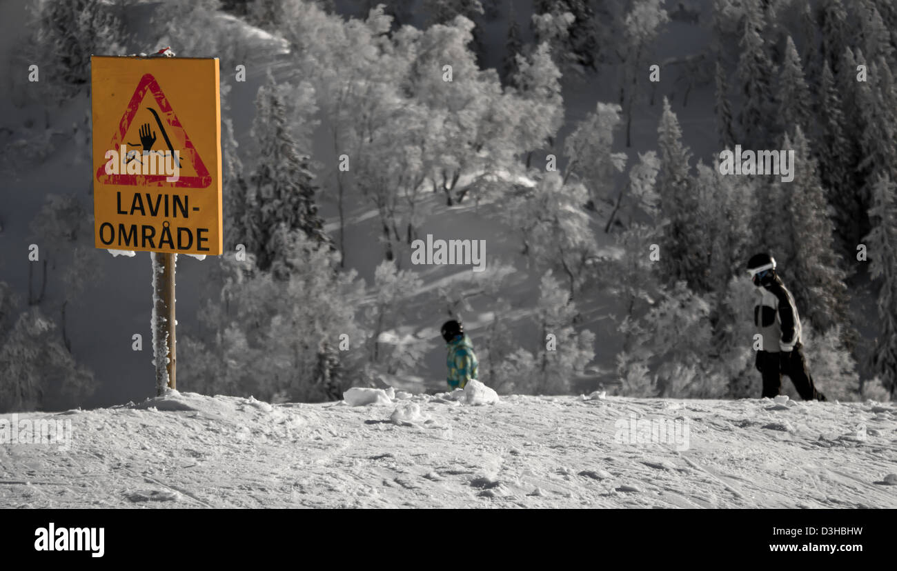 Snowboarders in avalanche area. Stock Photo