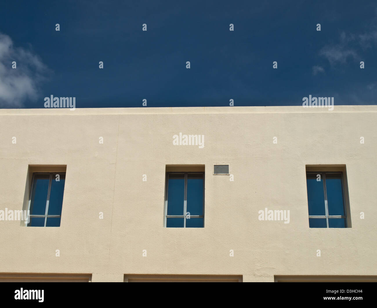 Facade windows of office building on blue sky Stock Photo - Alamy