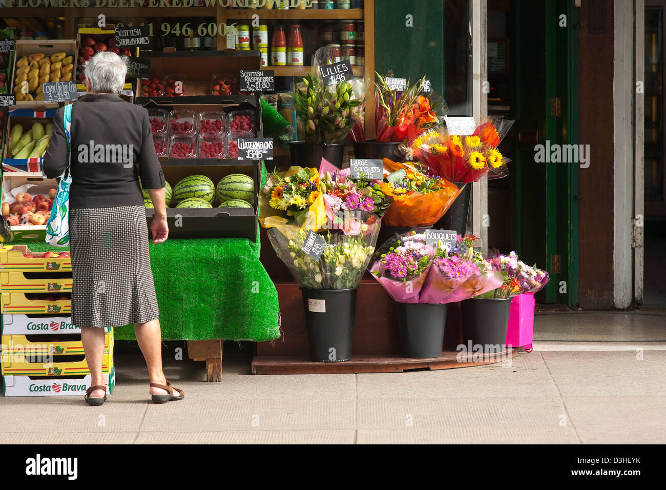Shopping at fruit and veg shop on Byers road in Central Glasgow is a