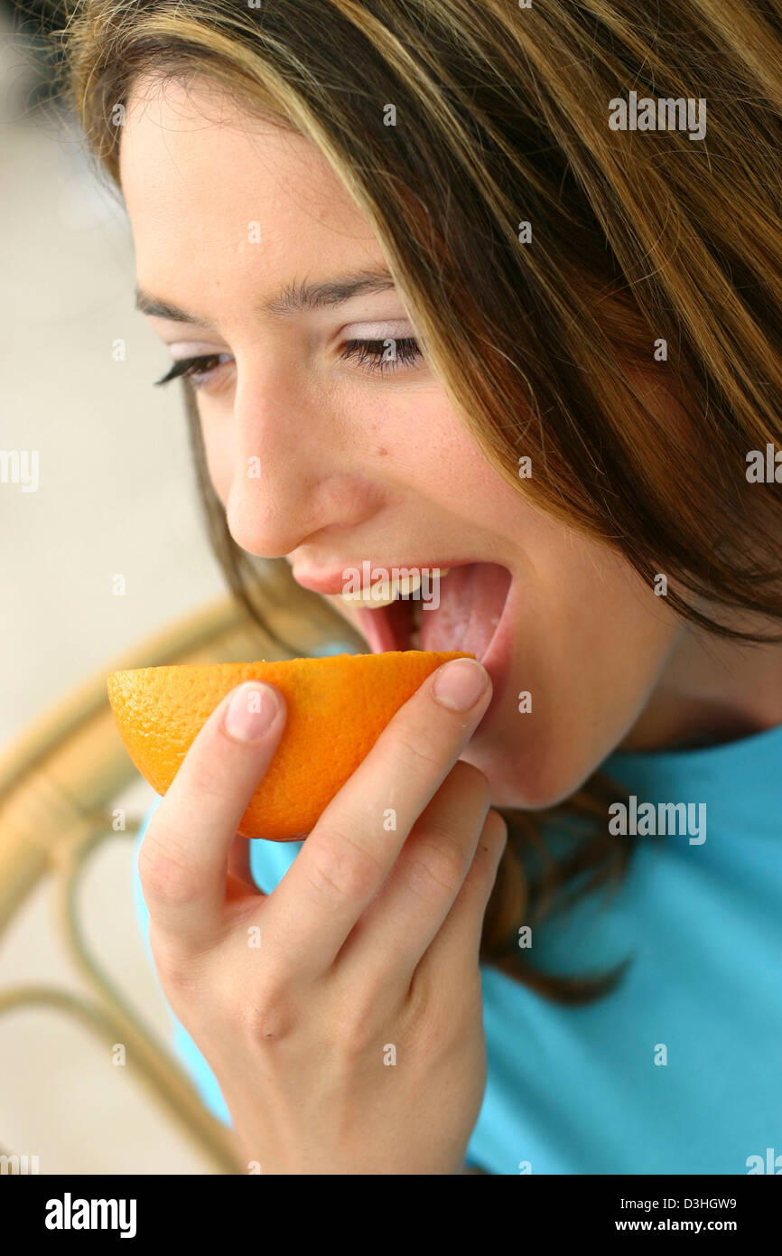 ADOLESCENT EATING FRUIT Stock Photo Alamy