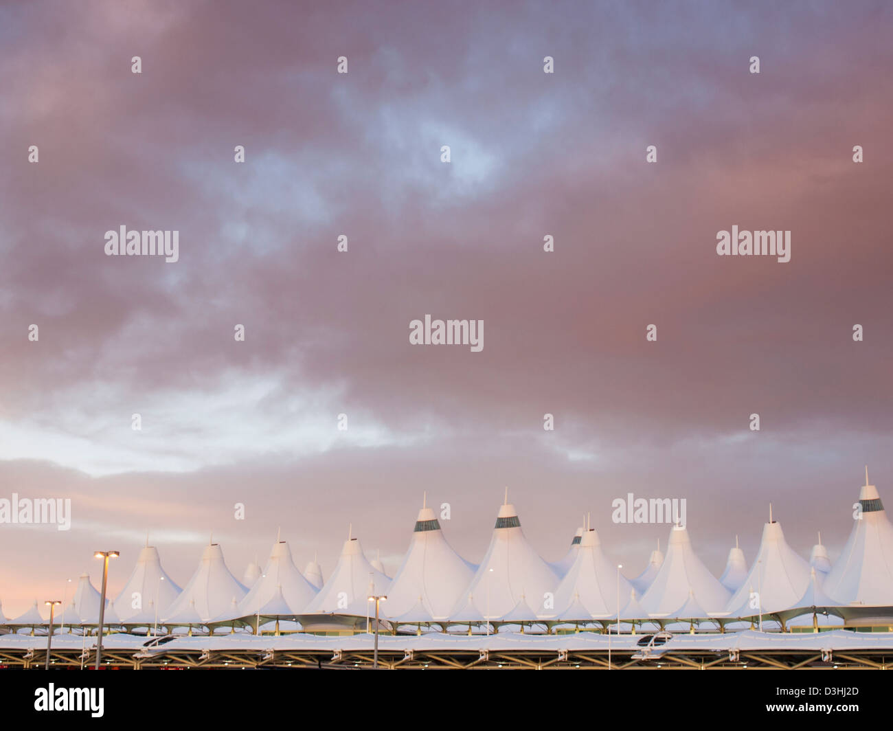 Denver International Airport at dusk with cloudy sky Stock Photo Alamy
