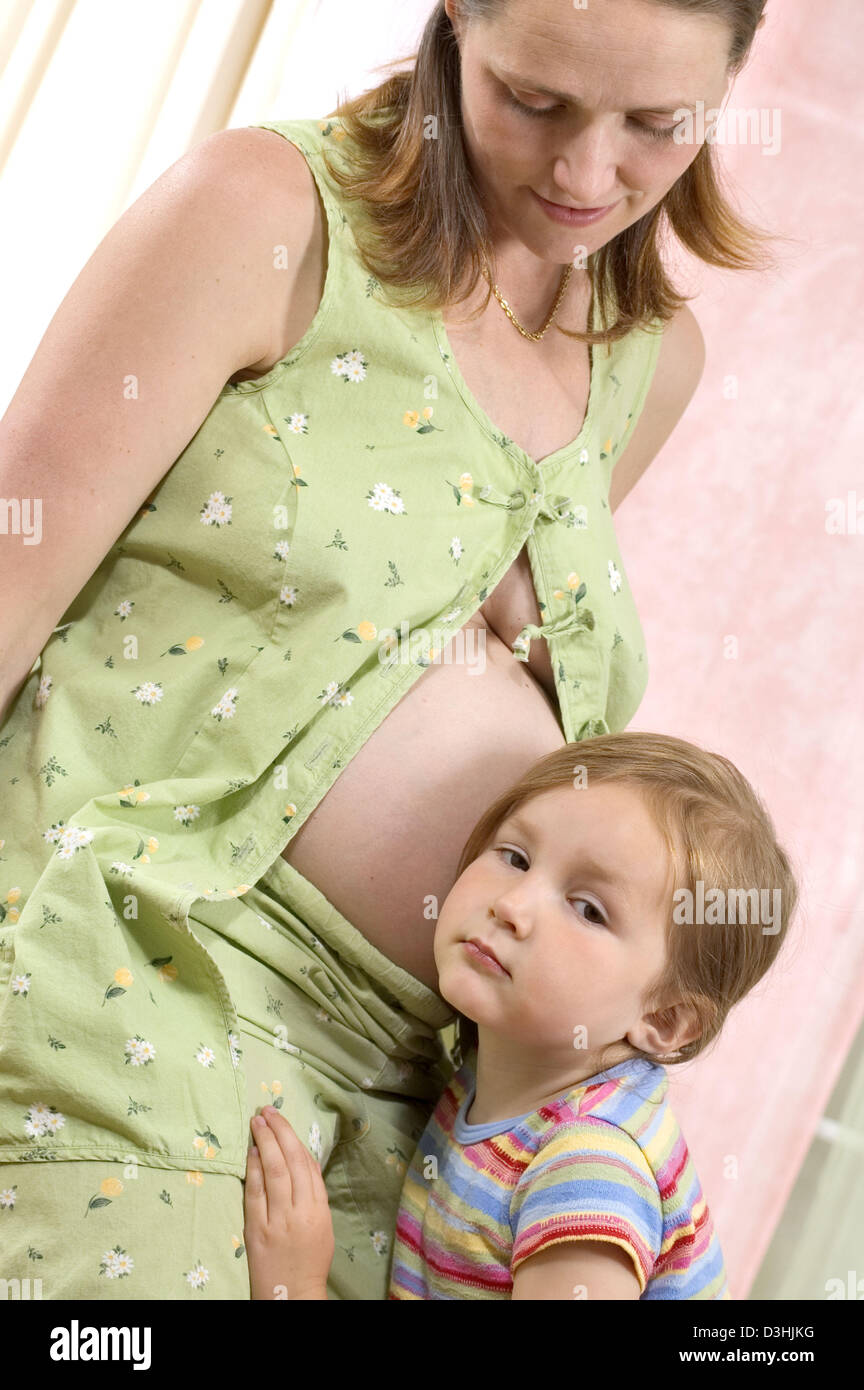 PREGNANT WOMAN & CHILD Stock Photo - Alamy
