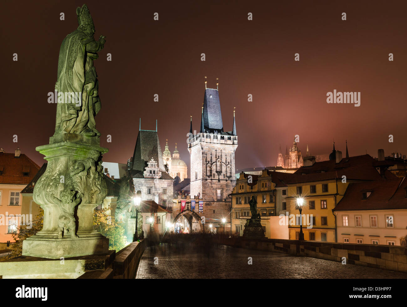 Charles Bridge with Mala Strana and Judith towers, Prague symbols joining historic quarters of Stare Mesto and Mala Strana. Stock Photo