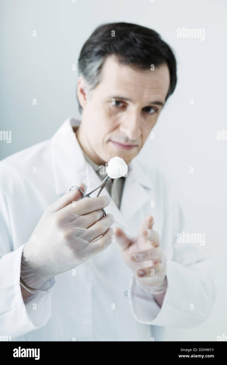 DOCTOR DISPENSING CARE Stock Photo Alamy