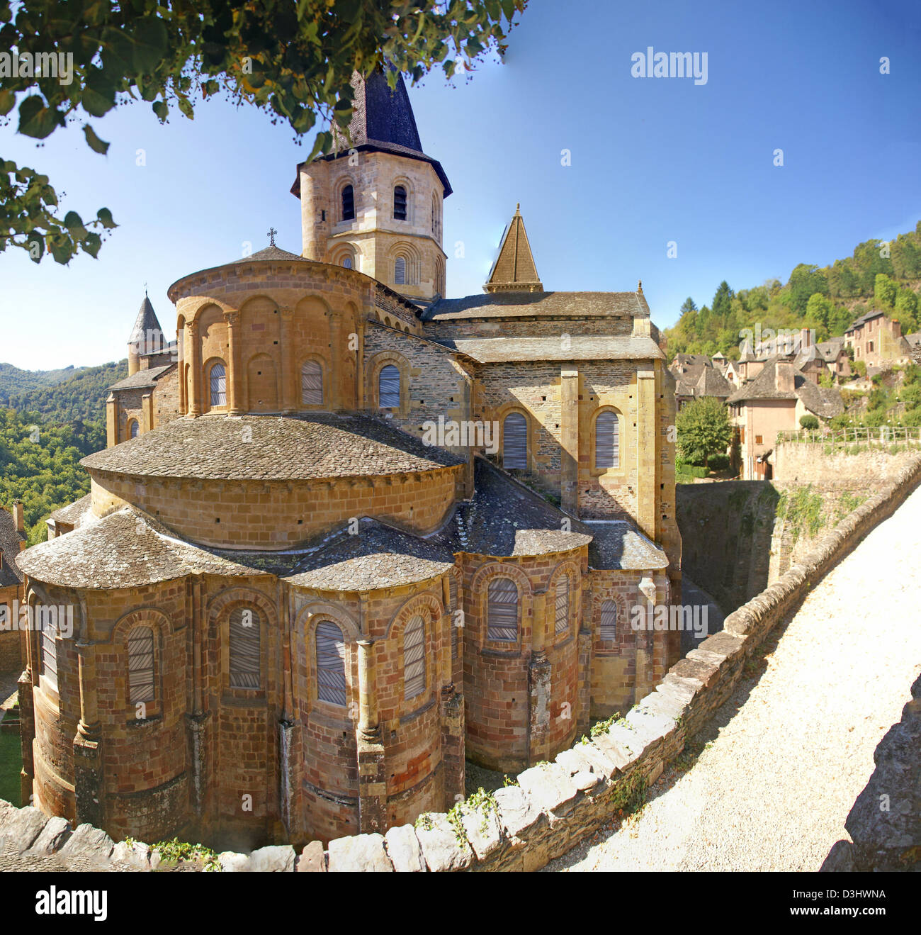 Exterior chapels and turrets from the 13th century, Abbey Church of St. Foy, Conques, France Stock Photo