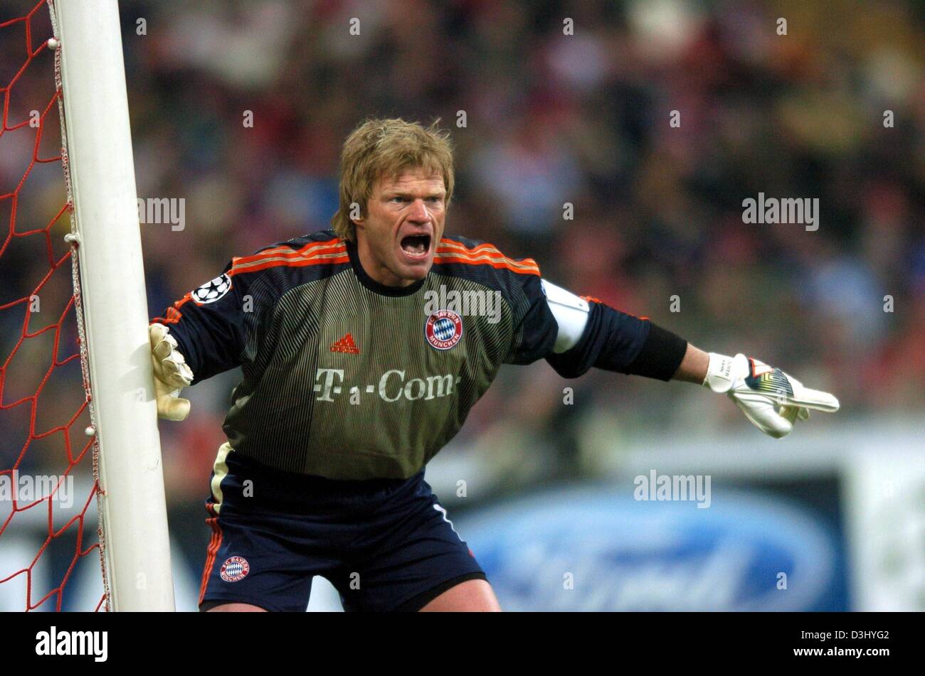 (dpa) Oliver Kahn in action during the Champions League match Bayern Munich vs. Real Madrid, the goalie of the German soccer club FC Bayern Munich missed the decisive goal in the match vs. Real Madrid on Tuesday, 24 February 2004 in Munich. The game ended in 1:1 draw. Stock Photo