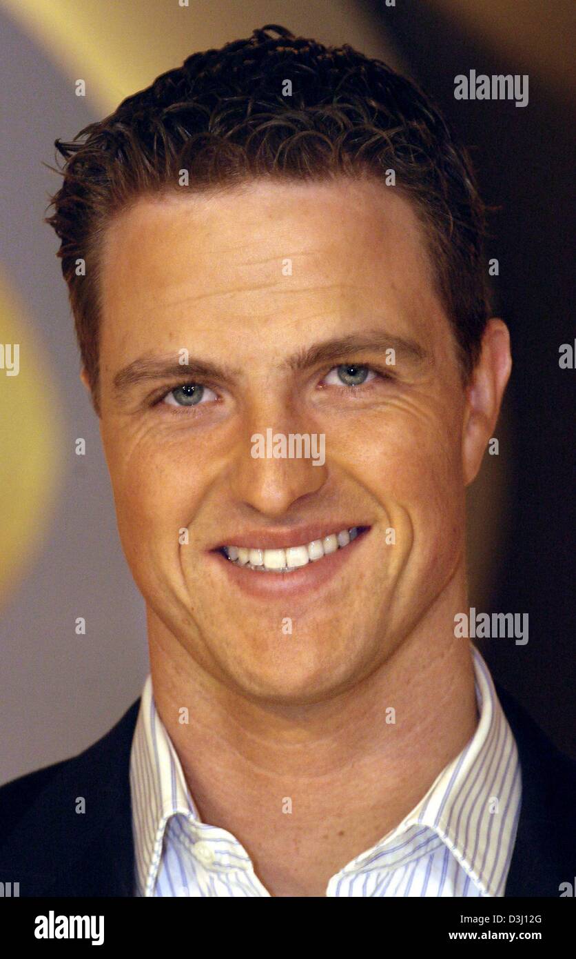 (dpa) - German formula one pilot Ralf Schumacher smiles after the