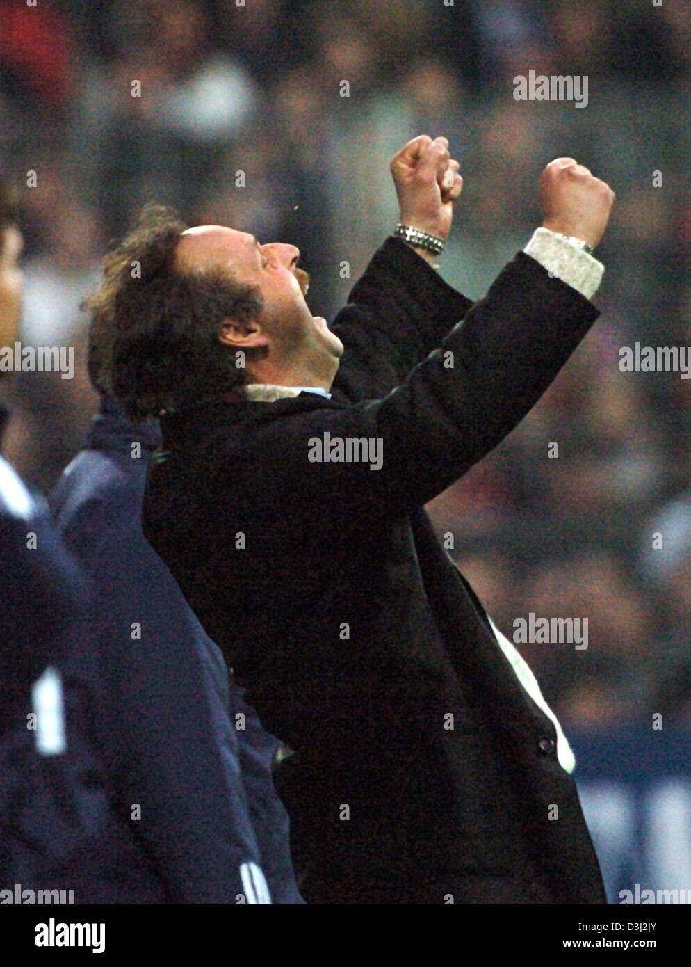 VfL Bochum coach Peter Neururer jubilates the the end of the match after his team won 1:0 against FC Bayern Munich on 14 February 2004 at the Rheinstadion, Germany. Stock Photo